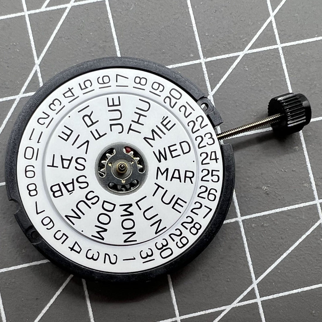 Swiss Made ETA 805.122 quartz watch with 3 hands, day/date display, and precision Swiss movement