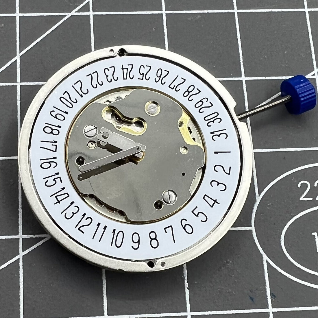 Ronda 5030D quartz watch movement with date at 6, Swiss parts for precise timekeeping.