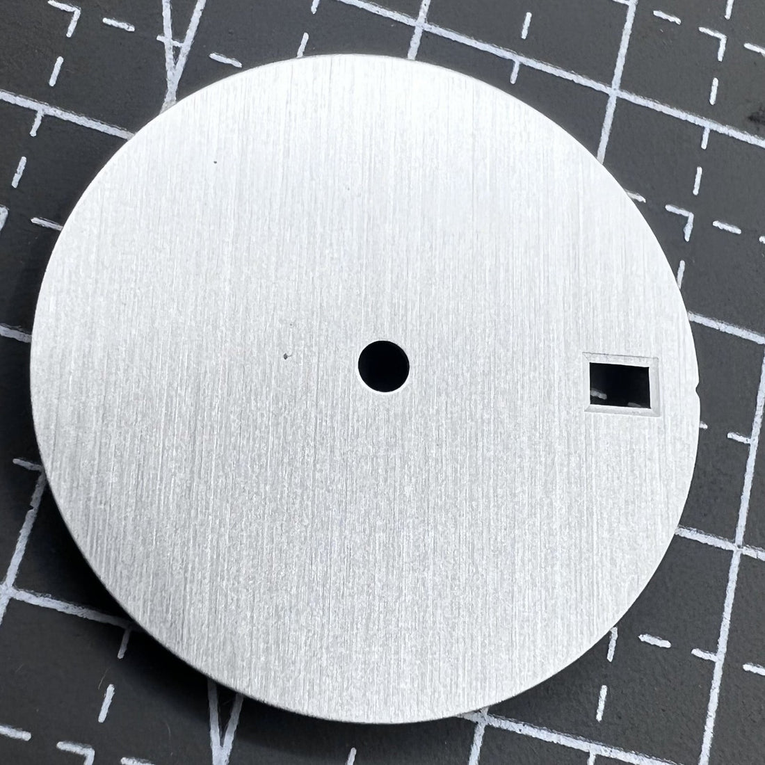 Silver 28.5mm watch dial with calendar, compatible with NH35/36 movement, ideal for precision watch repair.
