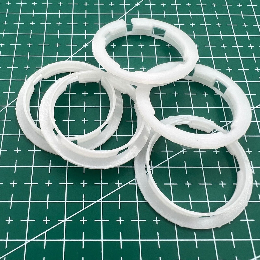 Set of 5 ETA 2824/2836/2846 watch movement spacer rings, 5.5mm cushion mount, precise fit for repairs.