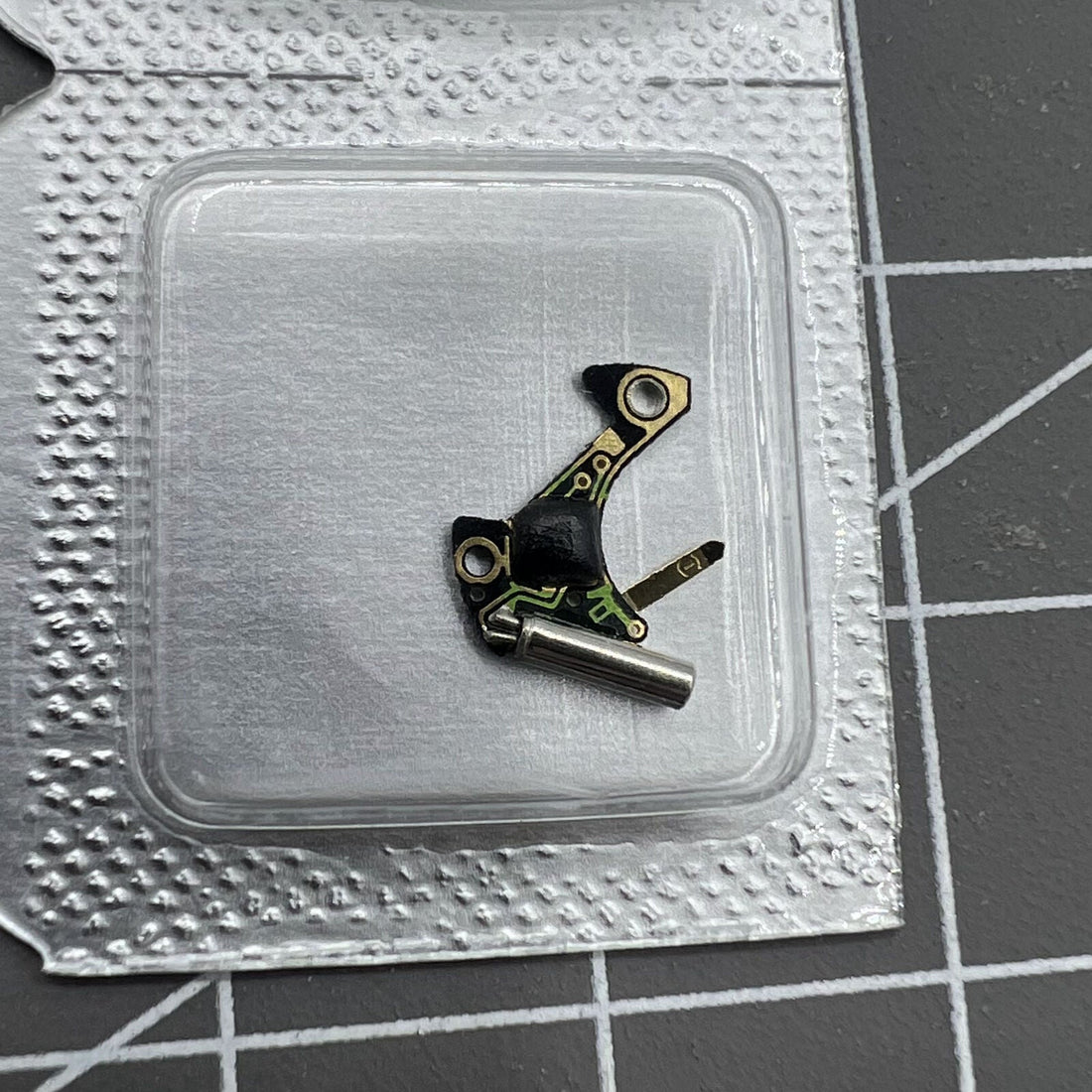 Circuit board for Ronda 1042 watch movement, precise fit for reliable timekeeping.