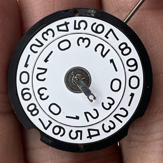 Ronda 509 quartz watch movement with Swiss parts, precise and reliable timekeeping mechanism.