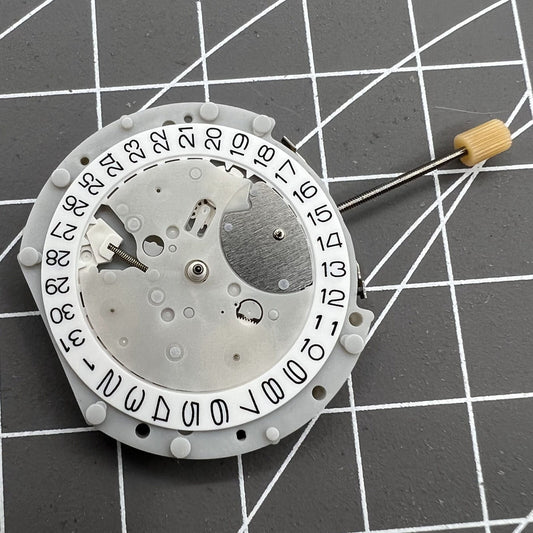 SL70 Quartz watch movement featuring small second subdials at 3, 6, and 9 positions for precise timekeeping.