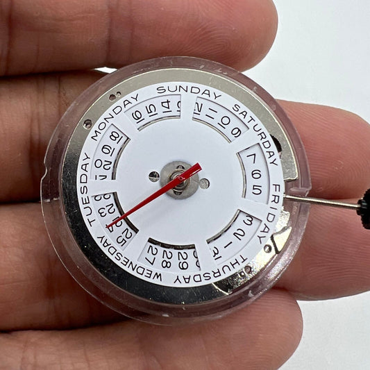 ST2147 automatic watch with mechanical movement, day at 12, date at 3, precise timekeeping.