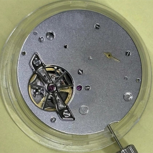 Tianjin Seagull ST25 mechanical watch movement with date at 12, precision China-made component.