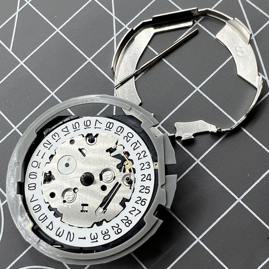 Hattori Epson TMI YM82A quartz watch movement by Japan Made, precise timekeeping for accessories.