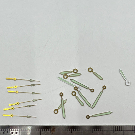 Silver-trimmed 12mm watch hands with green lume, compatible with Hattori Epson PC32 quartz movements.