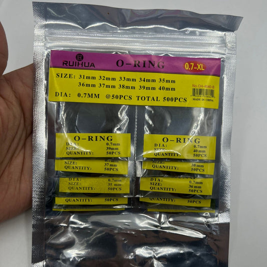 Wholesale pack of 950 assorted silicone watch gaskets and O-rings for watch case sealing.