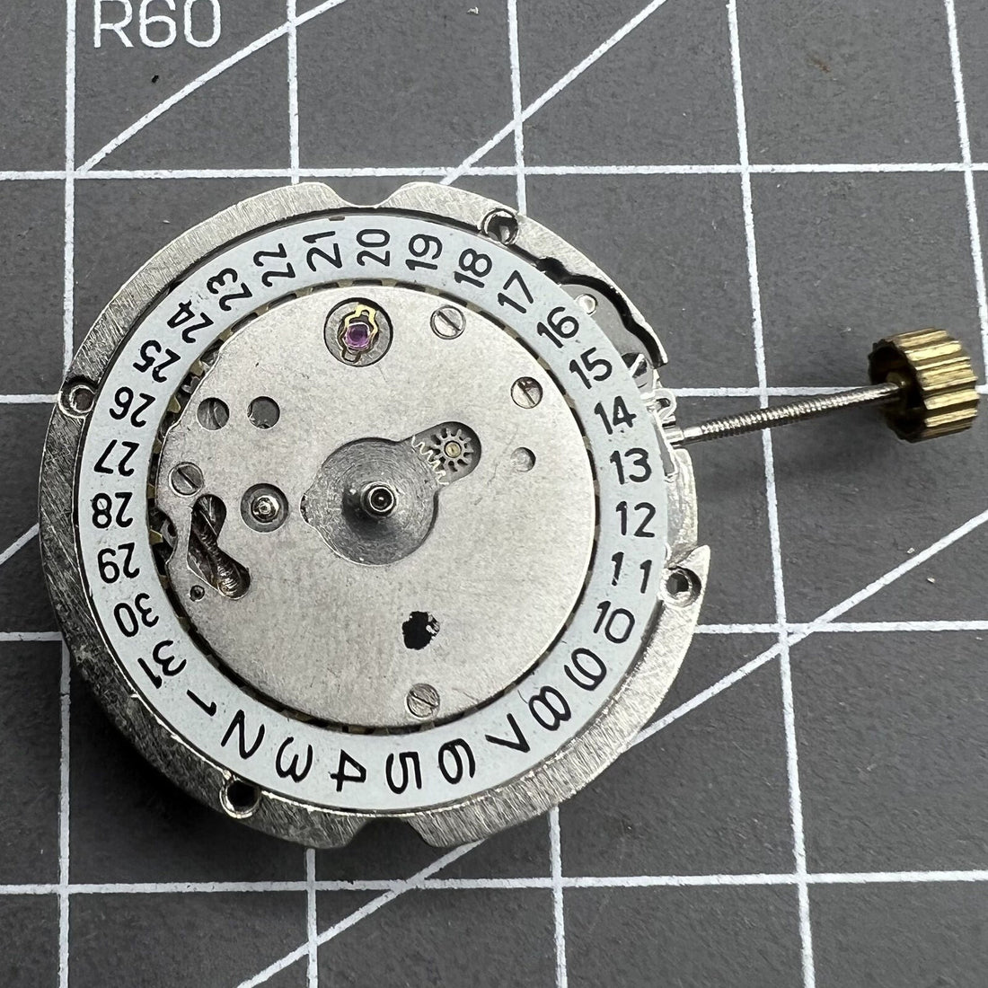 Shanghai 8120 automatic mechanical watch movement for hands-on disassembled practice, precise engineering detail.