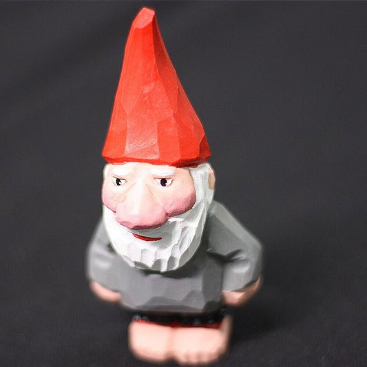 Handmade wooden dwarf garden elf figurine, charming decorative sculpture for outdoor display.
