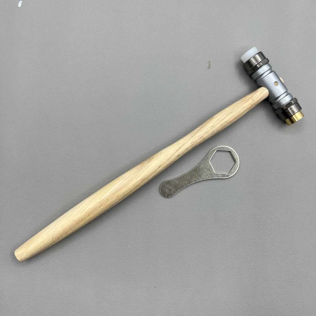 Bergeon Hammer 30417 with interchangeable brass heads for precision watch repair tools.