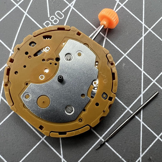 Close-up of Japan Made Miyota GP52 quartz watch movement showcasing precise craftsmanship and reliable timekeeping.