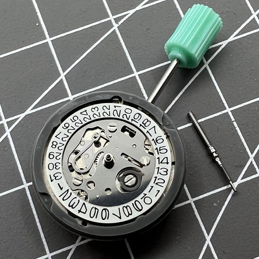 Seiko SII NH05 automatic watch movement showing date at 3 o'clock, Japan made precision mechanism