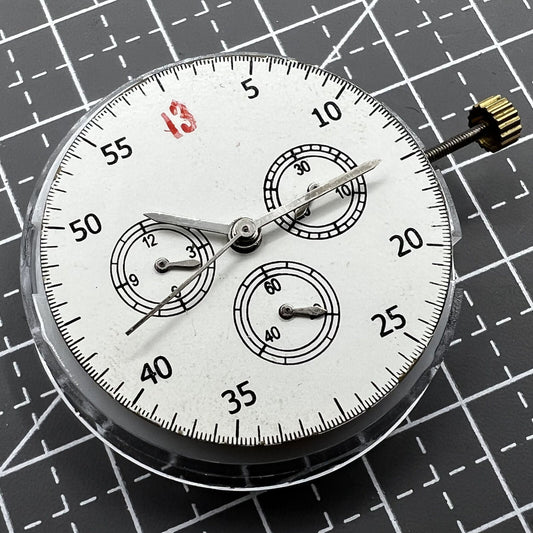 Dandong 7750 mechanical watch movement showing small seconds at 3, 6, and 9 o?clock positions without calendar.
