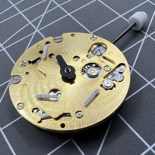 ISA 9232 Golden Date watch with quartz movement and three hands, highlighting the date at 3 o?clock.