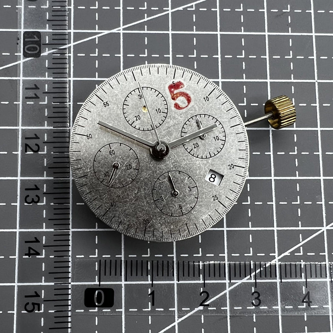 Dandong 7753 automatic mechanical watch movement with small second at 9 o'clock, precise timekeeping.
