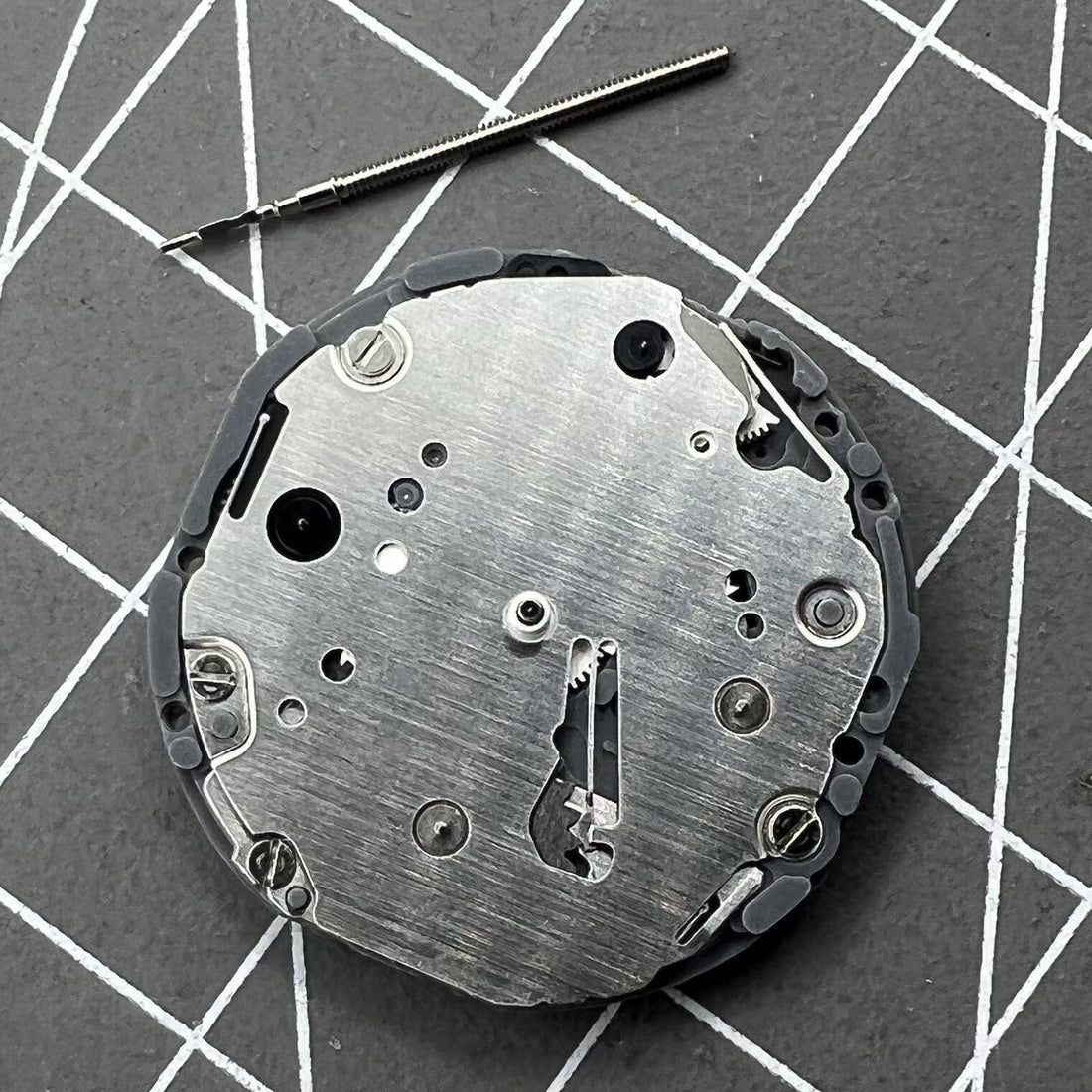 Hattori Epson TMI VD84A quartz watch movement for precise timekeeping in watch accessories.
