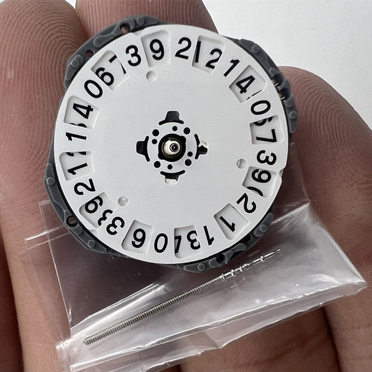 Hattori Epson TMI VJ76 quartz watch movement, precision Japanese craftsmanship for accurate timekeeping.
