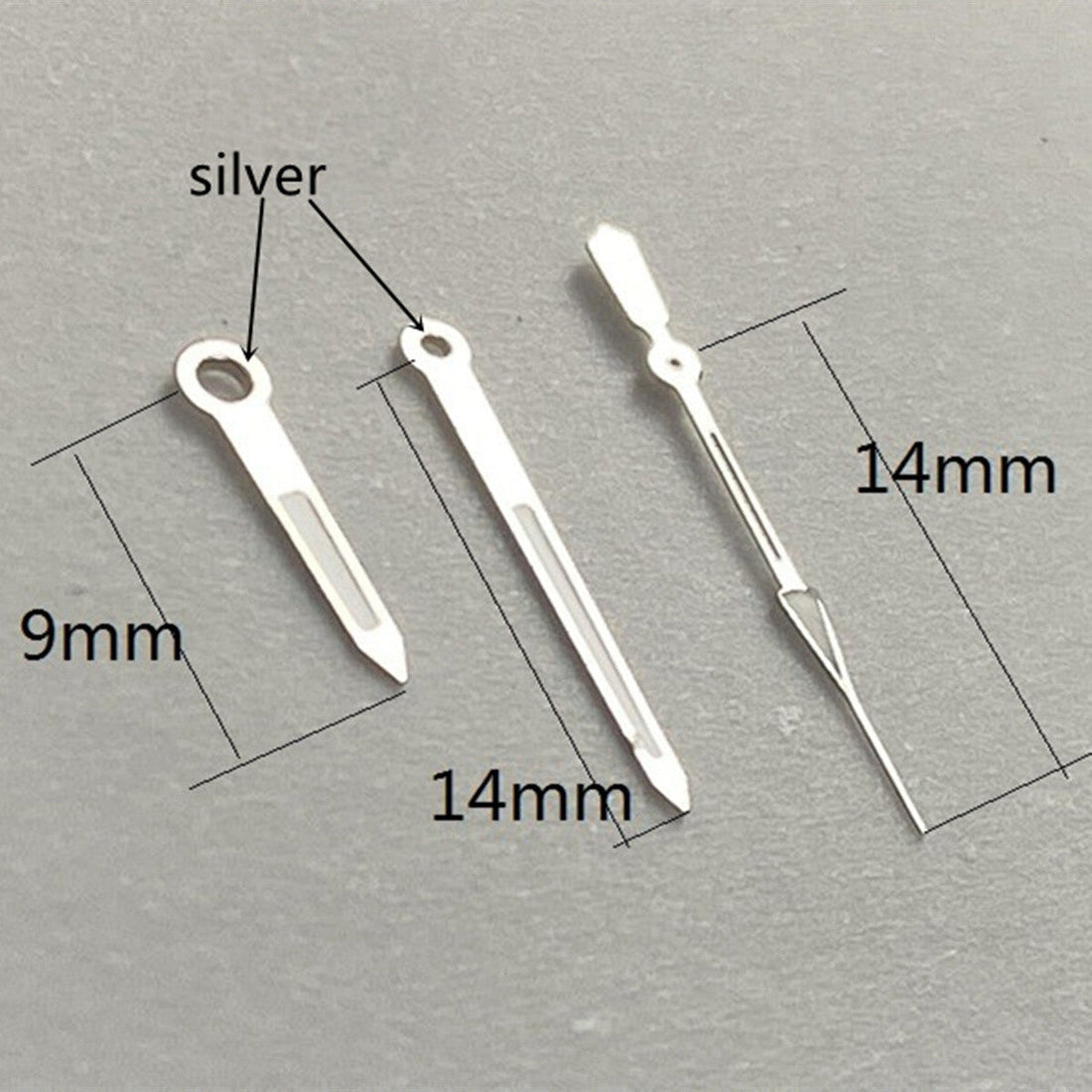 14mm silver trim watch hands with green lume for Ronda 515 quartz, enhancing visibility and style.