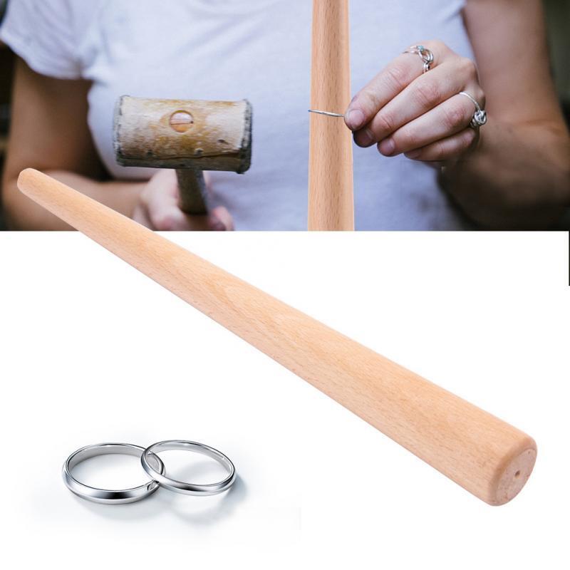 Wood tapered mandrel ring stick tool, ideal for shaping finger rings in various sizes.