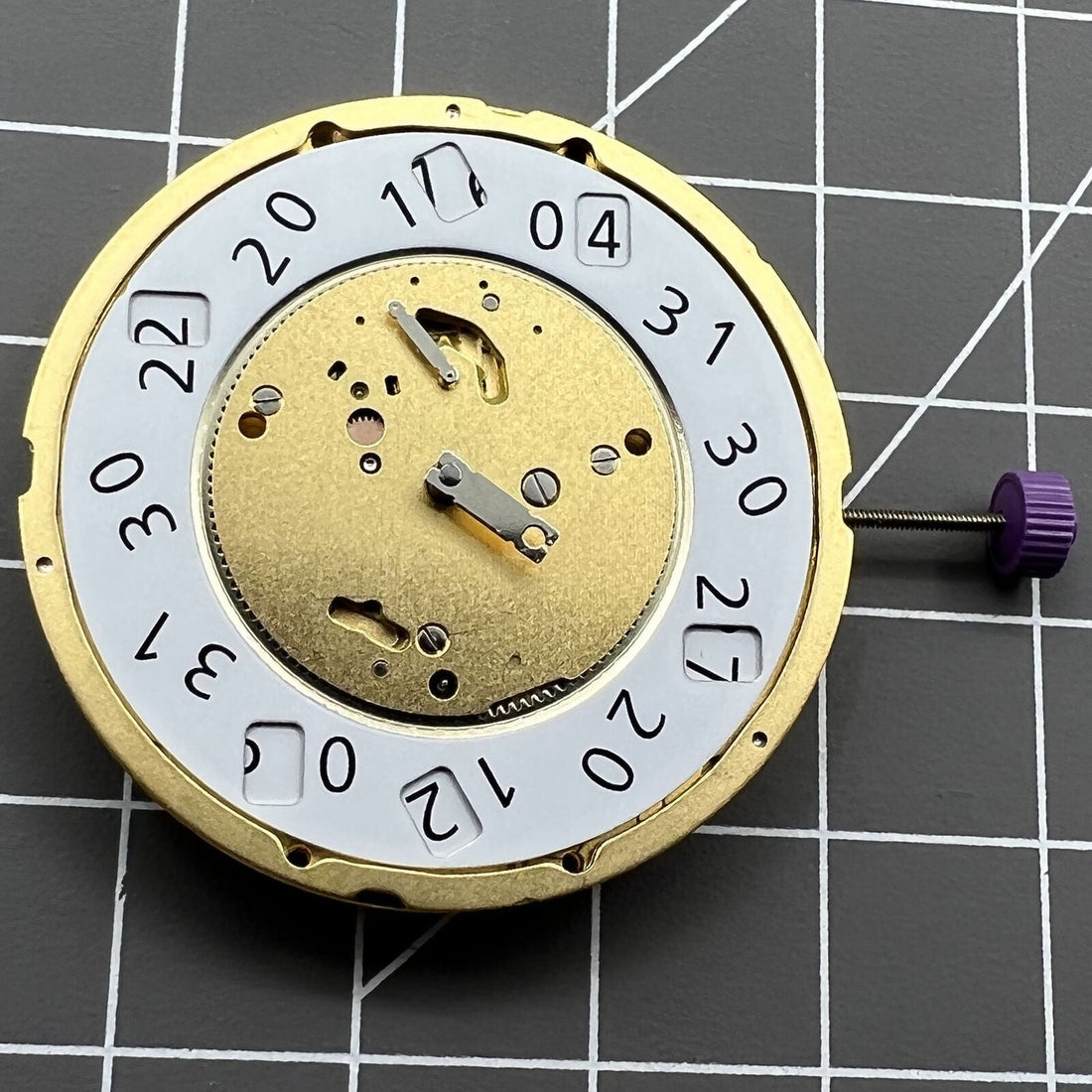 Ronda 7004P Swiss Made quartz watch movement with precision 3 hands for reliable timekeeping.