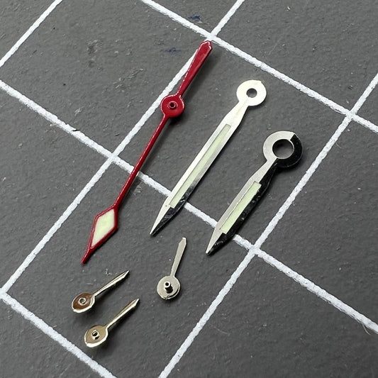 Green luminous 10.5mm silver-trimmed watch hands set for China 7120 movement.