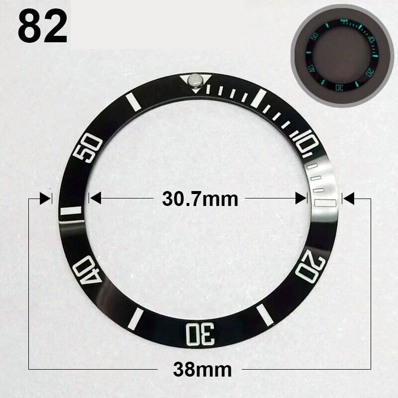 Ceramic 38mm black watch bezel with silver font and green luminous details for watch repair.