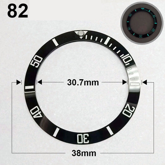 Ceramic 38mm black watch bezel with silver font and green luminous details for watch repair.