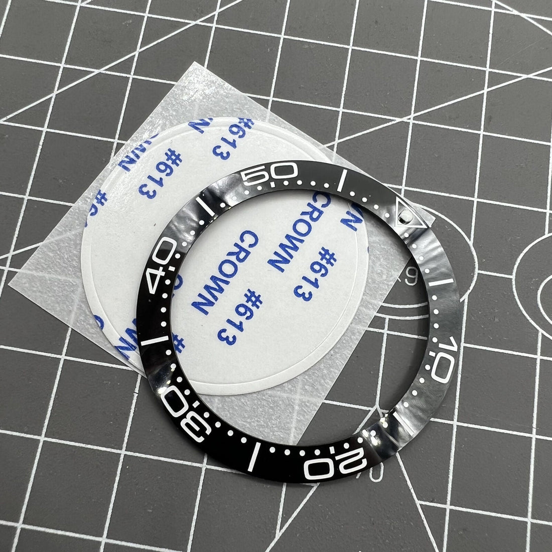 41.5mm/32.5mm ceramic watch bezel insert with black bezel and white font, durable replacement accessory.