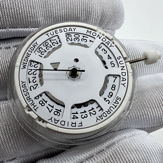 ISA 1198 quartz watch movement with day-date feature and white dial, ideal for watchmakers.
