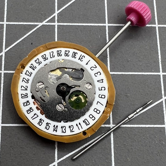 Miyota 9T13 Quartz Movement with date at 6 o'clock, precision Japanese watch component.