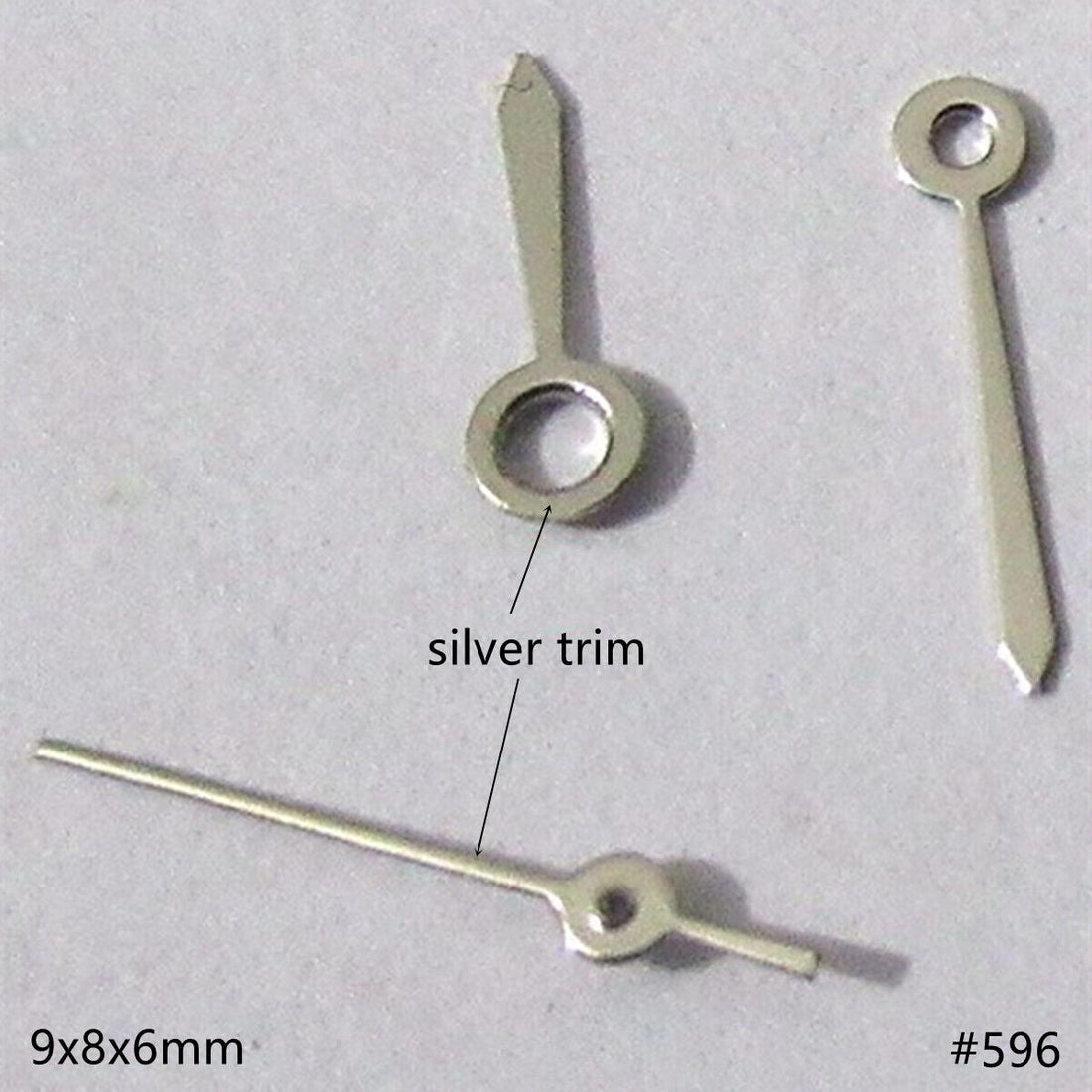 9mm silver painted watch hands set for Miyota 2035 movement, precise and stylish accessory.