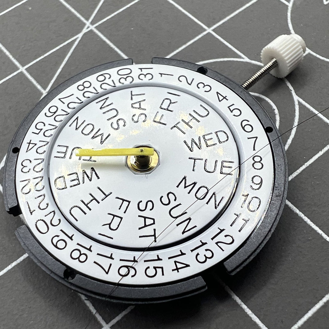 ISA317 watch quartz movement with 3 hands and double calendar, ideal for precise timekeeping and date display.
