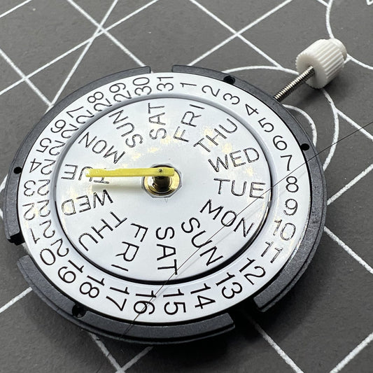 ISA317 watch quartz movement with 3 hands and double calendar, ideal for precise timekeeping and date display.