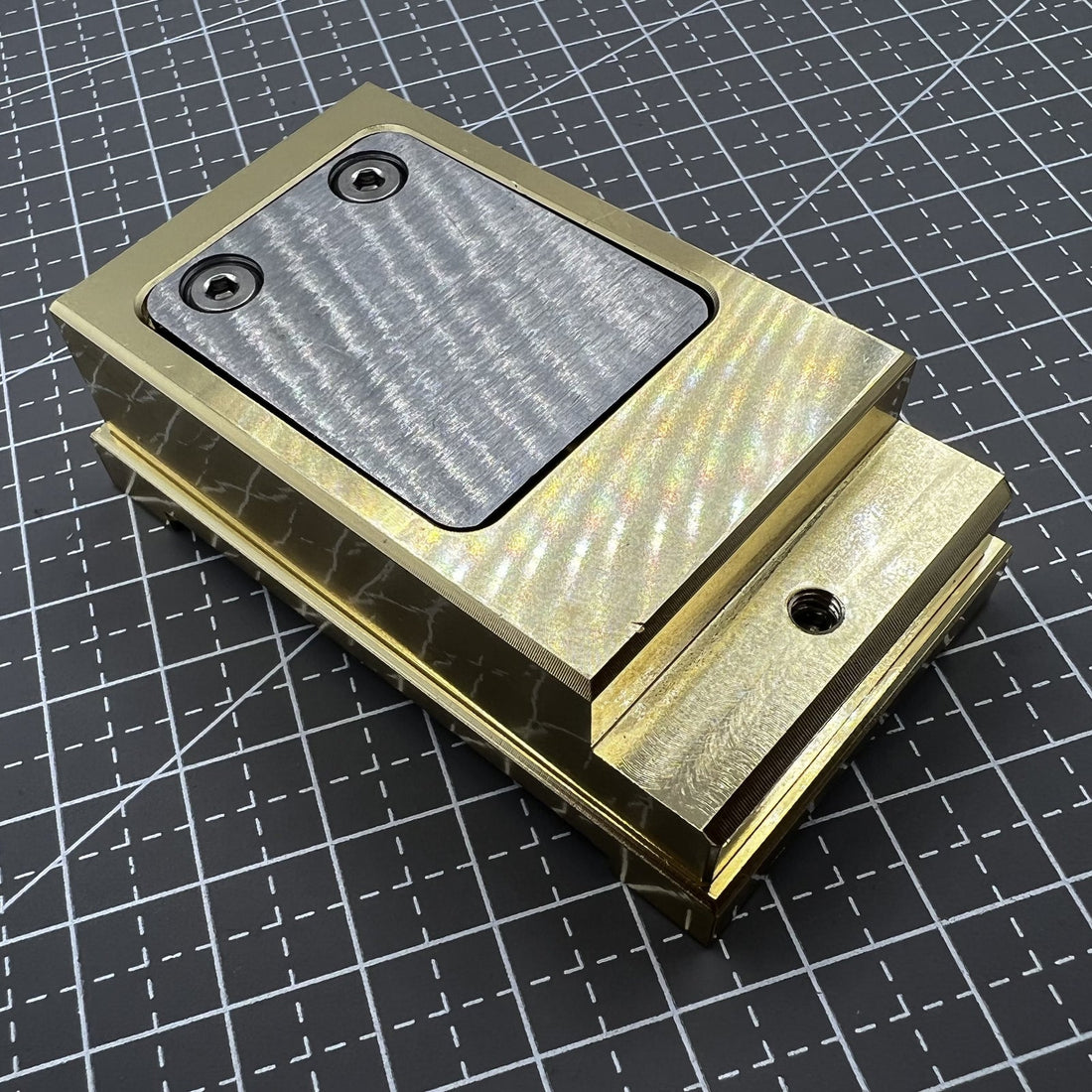 Brass-capped stainless steel pegwood tool by Woodcutter for precise watch cleaning and maintenance.