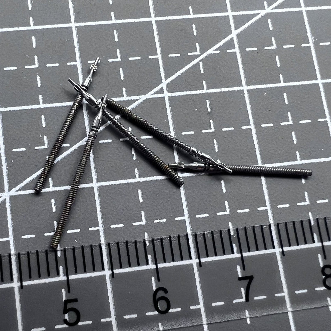 Set of 5 replacement watch winding stems compatible with Miyota 3D10 3D44 movements, durable and precise.