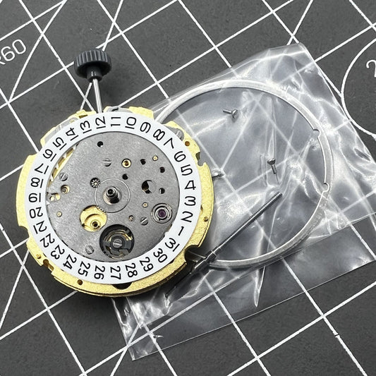 Golden watch accessory featuring Miyota Citizen 8200/8215 mechanical movement with double calendar at 3 o'clock.