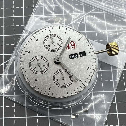 7750 Black dial chronograph watch with 3 hands, small seconds at 9 o?clock, and day-date display.