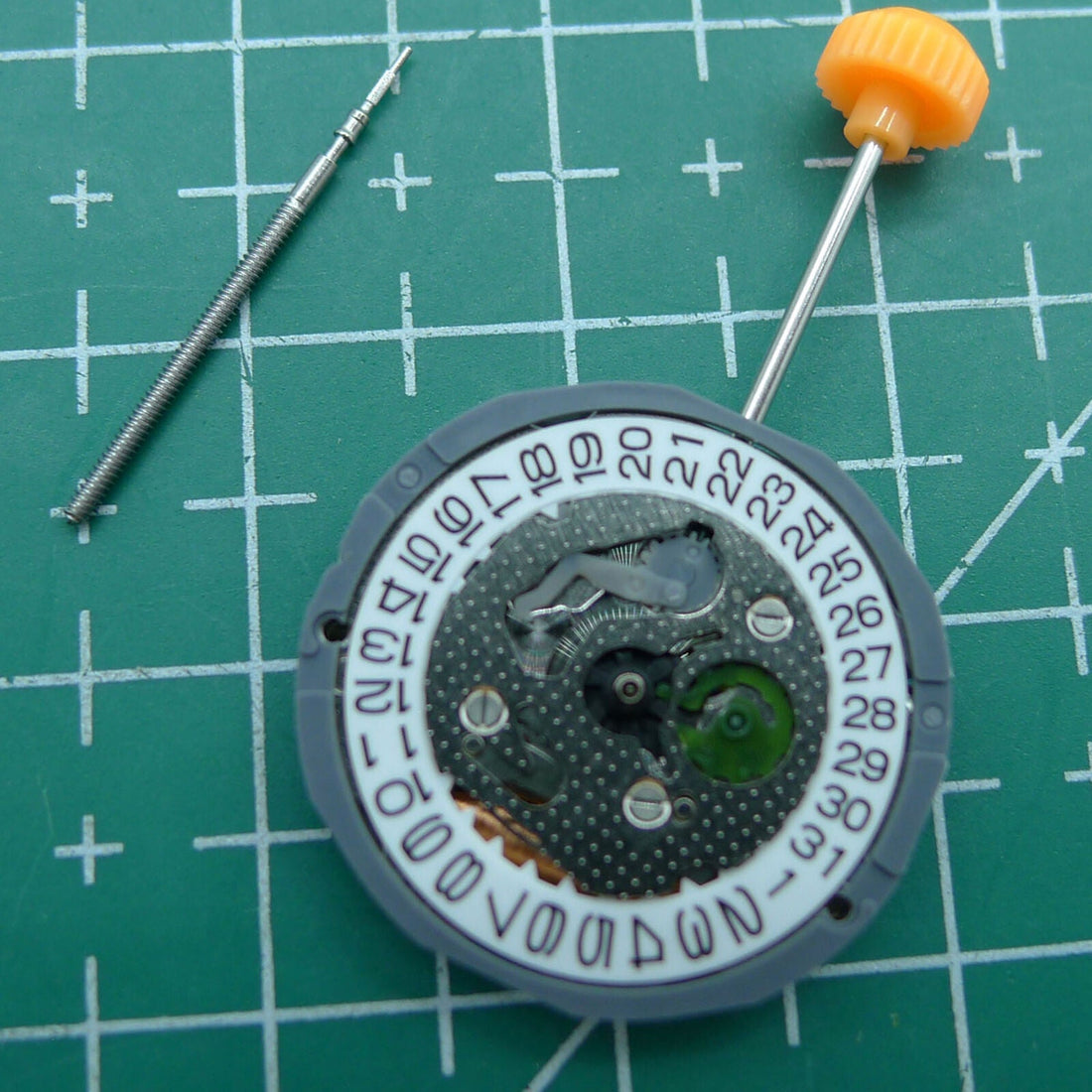 Miyota 1L12 Japan quartz watch movement with date at 3, reliable precision craftsmanship.
