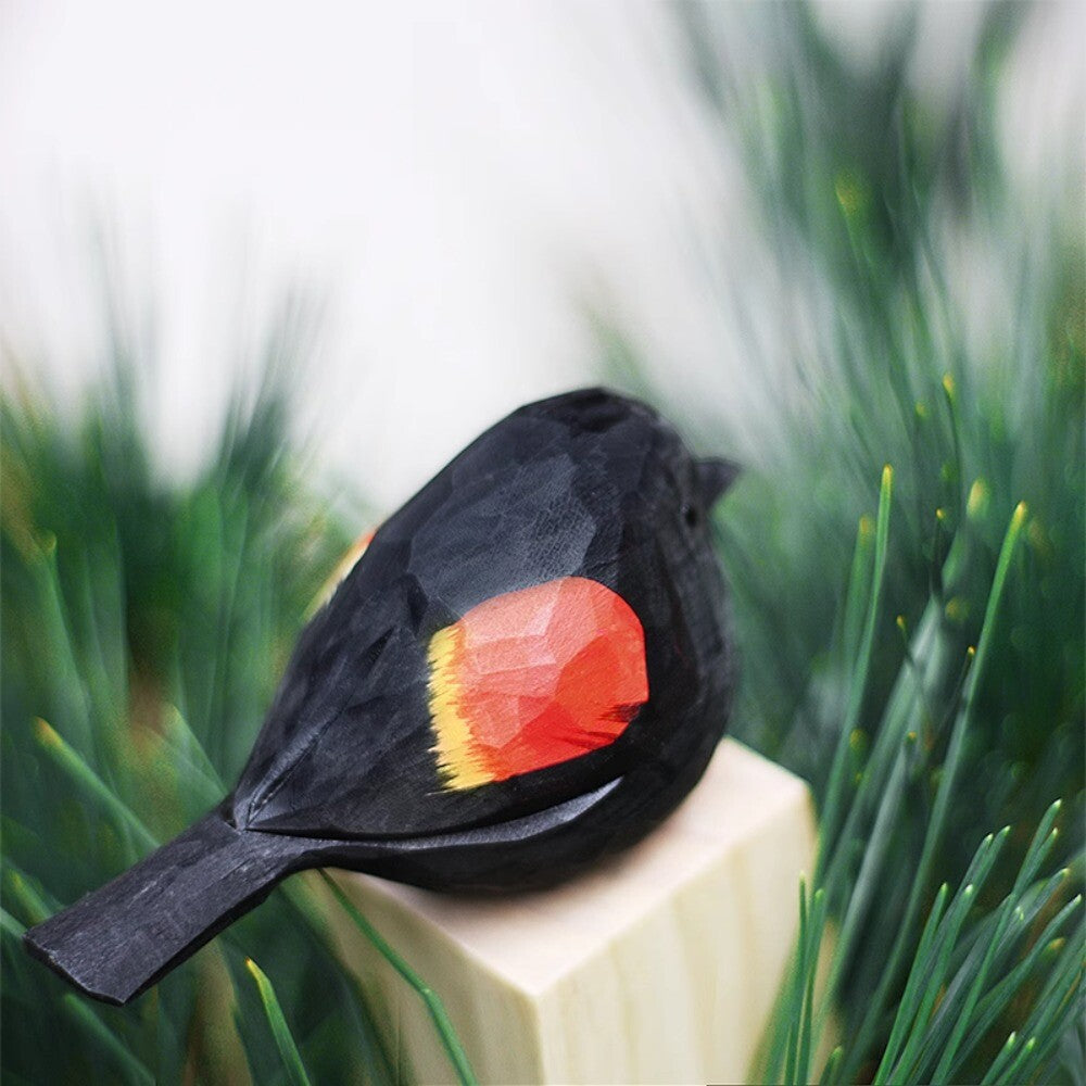 Hand-carved Handmade Red-winged Blackbird wooden figurine, perfect decorative collectible for nature lovers.