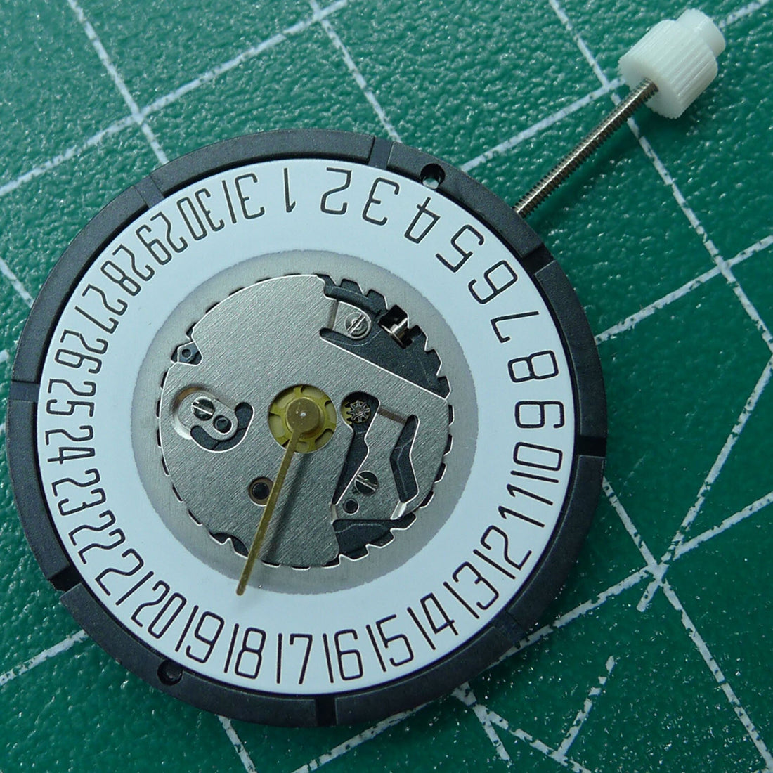Wholesale Swiss ISA 2331 black dial quartz watch part with date display at 6, ideal for watch repair.