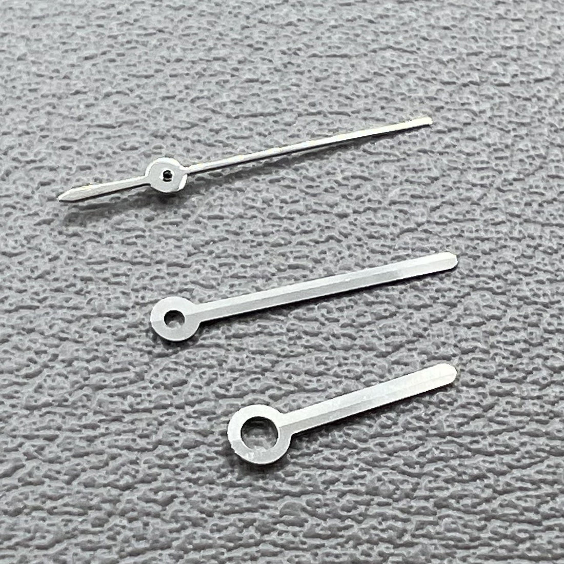 Silver-tone 10mm watch hands set for Miyota 2315 2035 2036 2115 2305 movements, precise design.