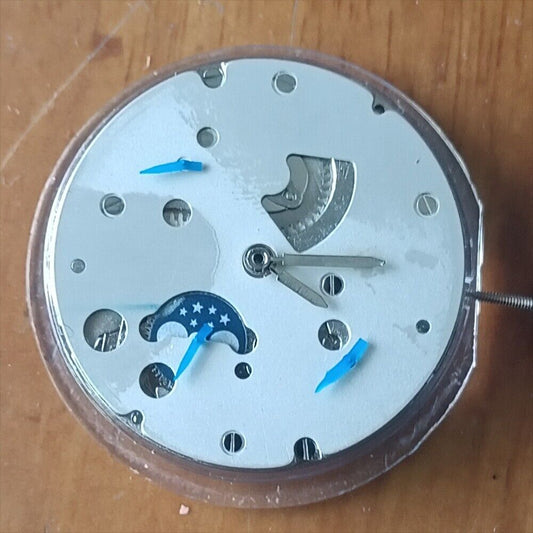 Hangzhou automatic mechanical watch with small second at 4 and moon phase display by China Made.