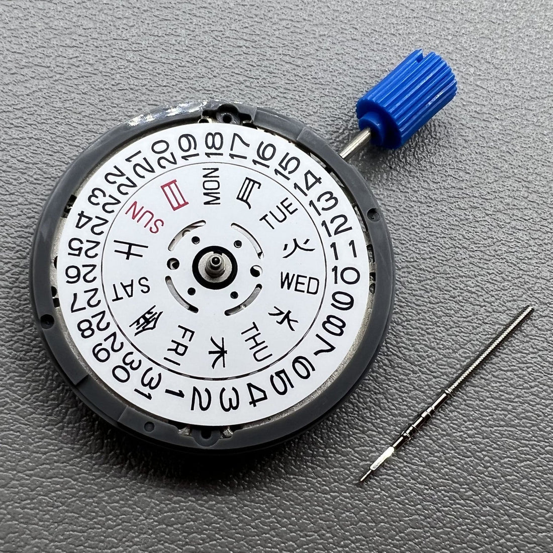 Seiko NH36 watch movement with white day-date disk, Japanese-English font, crown positioned at 3.8.