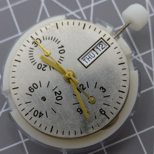 ETA 7750 chronograph watch movement showcasing automatic day-date function at 3 o'clock.