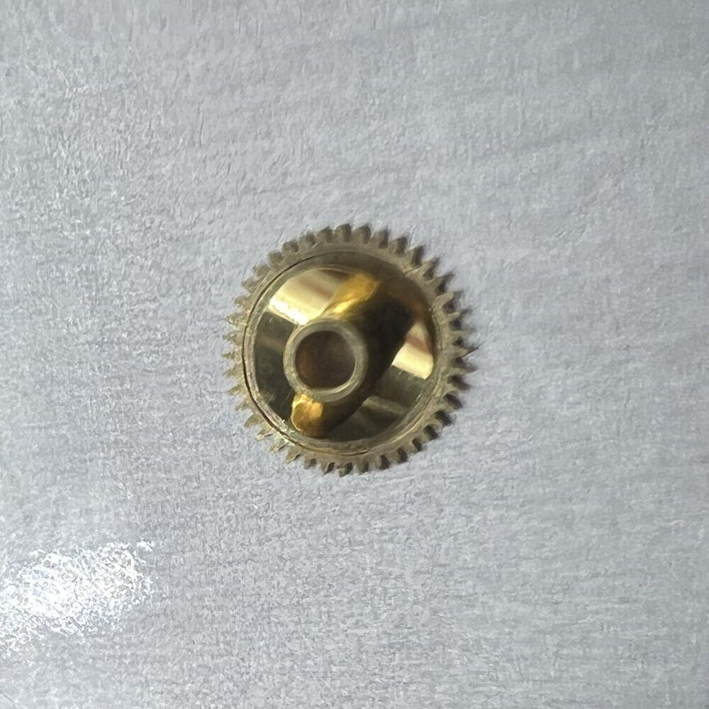 Watch Part Hour Wheel H1 for ETA 902.002 quartz movement, precise timekeeping component.