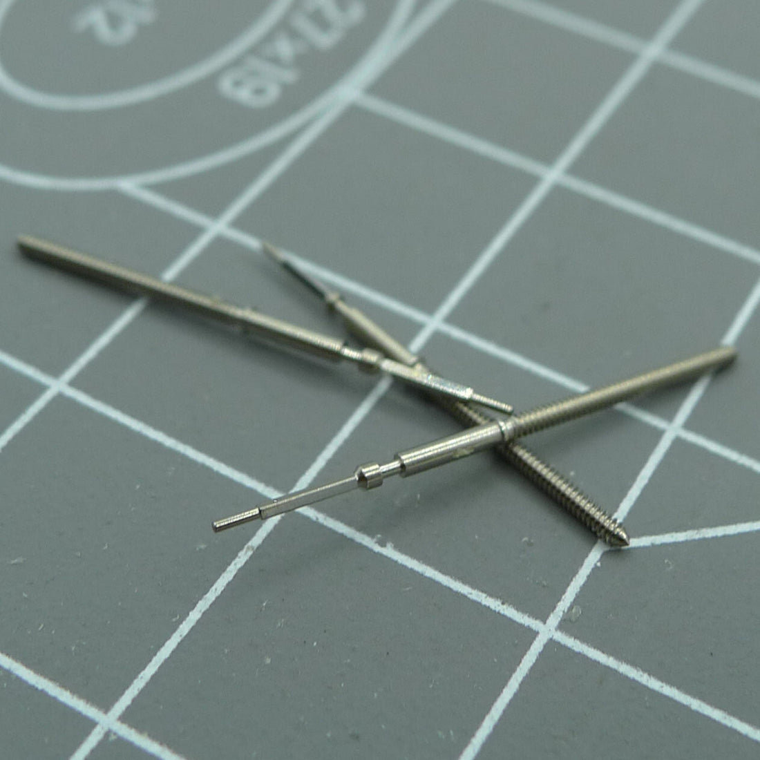 Watch winding stem for Ronda 6003D quartz movement, precise fit for winding and time setting.