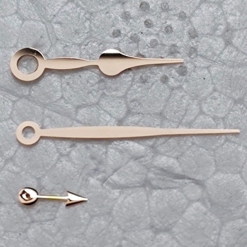 Polished rose gold watch hands set for Mingzhu 2813 movement, sleek design, perfect for repairs and upgrades.