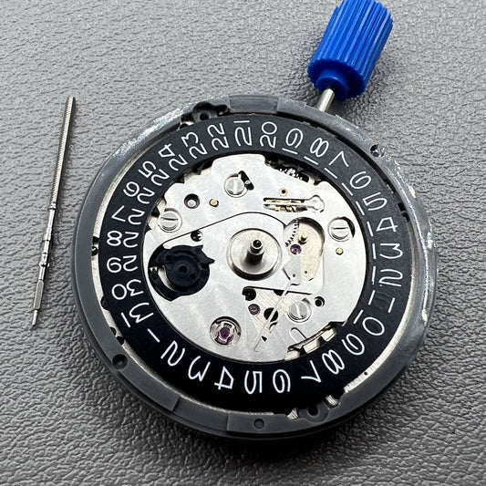 Japan NH35 vintage automatic watch movement with 24 jewels and black date wheel for precision timekeeping.