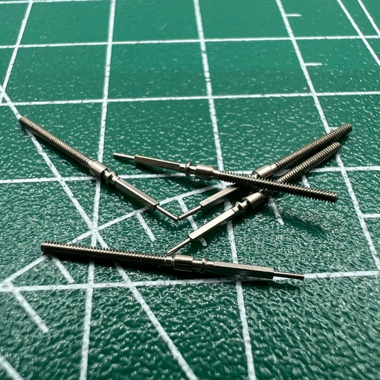 Wholesale lot of watch winding stems spare parts for China Made ST2555, perfect for repairs and replacements.